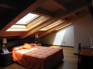Postel nebo postele na pokoji v ubytování Hotel Rolle