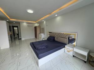 a bedroom with a large bed in a room at Ashmita Shahi House in Kathmandu