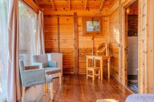 a room with a desk and chairs in a cabin at 11-11Shambala in Fethiye +167 photos