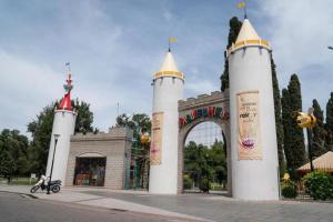 a building with two white towers with a gate at Condominio Diamante in San Rafael