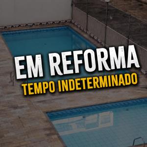 a swimming pool with the words evremonia temporo indeterminario on it at Itaparica Praia Hotel in Vila Velha