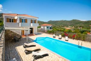 an image of a villa with a swimming pool at Villa Alexandra in Katelios