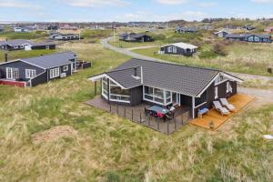 an overhead view of a house in a field at LN602-Hjorring-Harerenden-71 in Hjørring