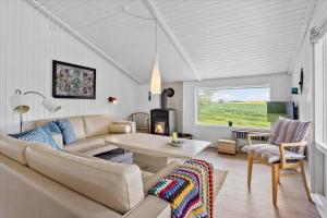 a living room with a couch and a table at SJ253-Haderslev-Vikaerparken-89 in Haderslev
