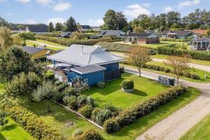 an aerial view of a house with a yard at SJ310-Hejls-Ronnebaervaenget-14 in Hejls