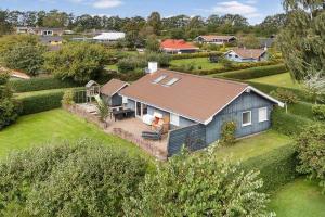 an aerial view of a house with a yard at SJ311-Hejls-Slaenvaenget-9 in Hejls