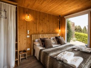 a bedroom with a bed in a room with a window at Villa Silvio Relais in Civitanova Alta +62 photos