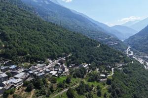 an aerial view of a village in the mountains at Renovated Triplex House 8 guests Orelle in Orelle