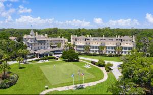 an aerial view of a large building with a park at Jekyll Island Club Resort in Jekyll Island