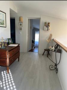 a living room with a dresser and a desk at Maison avec jardin & proche plages in Saint-Jean-de-Védas +7 photos