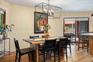 a dining room with a table and chairs at Winter Park Place #1 in Winter Park +12 photos