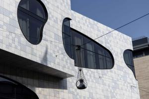 a pair of windows on the side of a building at COVE Centrum in The Hague
