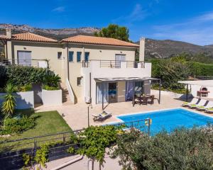 an image of a villa with a swimming pool at Villa Caterina in Skala