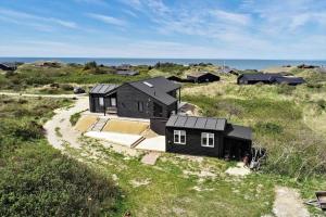 an aerial view of a house on the beach at LN1865-Hirtshals-Krageklit-30 in Hirtshals