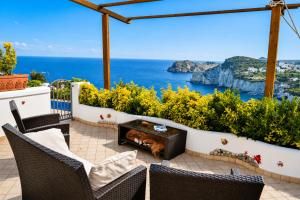 a patio with a view of the ocean at Maridea - La Procella in Ponza
