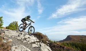 a man riding a bike on top of a rock at The Koze in Leitrim