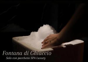a person is standing on a bath tub filled with snow at Relax in Puglia in Corato +10 photos