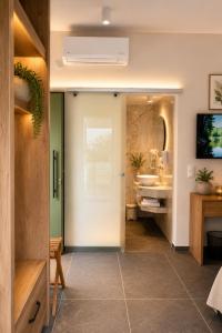 a bathroom with a toilet and a sink at Casa Enetiko in Chania +164 photos