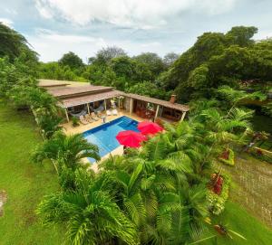 an aerial view of a house with a swimming pool at Majestic Sands in San Carlos