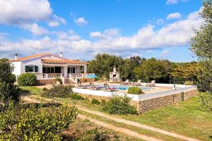 a house with a swimming pool in the yard at Villa Son Domingo by Villa Select in Alaior