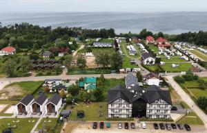 an aerial view of a small town with houses at Gęsi Puch in Gąski
