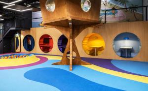 a childrens play area with a play room with circular windows at Hotel Nacional in Rio de Janeiro