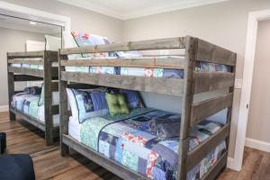 a couple of bunk beds in a room at 4 bedroom, 3 bathrooms Pool Home in Orange +40 photos