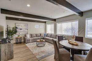 a living room with a couch and a table at 5 Bedroom plus loft room, 3 Bath home in Fullerton