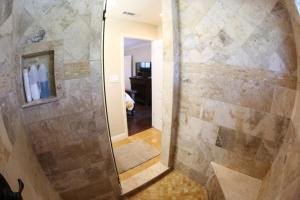 a bathroom with a shower with a walk in shower at Comfy Pool Home,1/4 mile Walk To Disneyland in Anaheim +21 photos