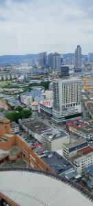 an aerial view of a large city with buildings at Imperial resident time Square KL in Kuala Lumpur