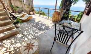 a balcony with a view of the ocean at Sea Side Solandra in Praiano