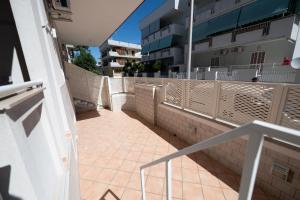 a balcony on a cruise ship with a building at B&B Francy and sons in Modugno