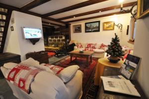 TV a/nebo společenská místnost v ubytování Haus Tiefbach - Apartment Cervino