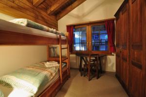 Postel nebo postele na pokoji v ubytování Haus Tiefbach - Apartment Cervino