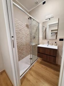 a bathroom with a shower and a sink at La Giara in Spoleto