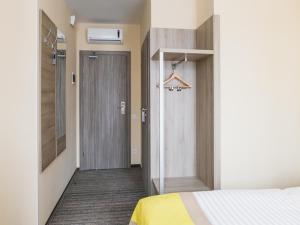 Postel nebo postele na pokoji v ubytování Raziotel Kyiv Yamska