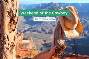 a poster of the grand canyon with a cowboy hat at Tombstone History & Cozy Cabin Glamping Stay in Tombstone
