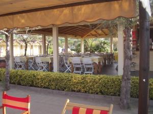 مطعم أو مكان آخر لتناول الطعام في Parco Vacanze Camping Sogno