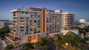 an aerial view of a building in a city at ONE GT Grand Cayman in George Town