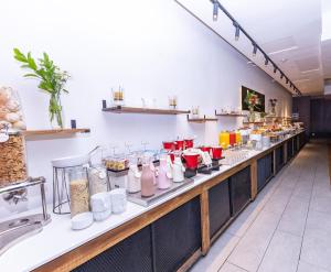 a buffet line with food items on display at Wyndham Concepcion Pettra in Concepción +26 photos