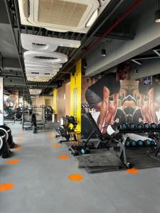 a man jumping on a treadmill in a gym at Moon escape studio in Ghaziabad
