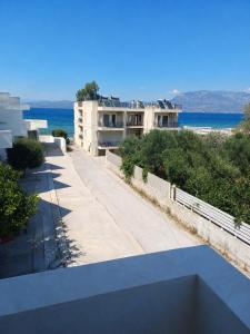 a view from the balcony of a building at DANAI'S Sea Whisper in Lékhaion