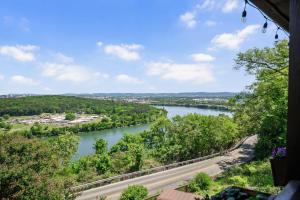 a view of a river from a house at Historic Riverview Inn Six in Chattanooga +26 photos
