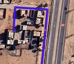an aerial view of a house with a road at Relax House 2 in Al Massira Airport