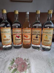 a group of bottles of wine sitting on a table at Do Vuceljica in Andrijevica +8 photos