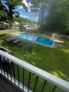 a view of a swimming pool from a balcony at Matt Cozy Quarters in Orangeburg
