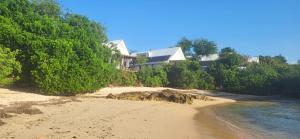 a house on the shore of a beach at Shiri Beach Resort in Zanzibar City