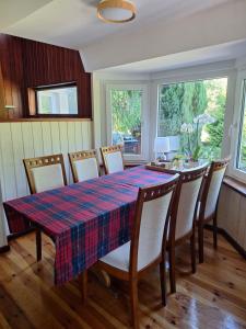 a dining room with a table and chairs at Przystanek Kaszuby in Kamień +19 photos