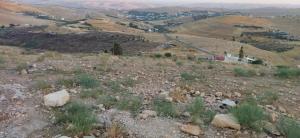a view from the top of a hill at Welcome back in Al Hāshimīyah