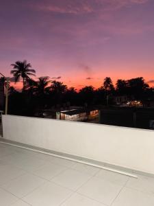 a sunset on the roof of a building at Casa de la Playa in Playa Azul +13 photos